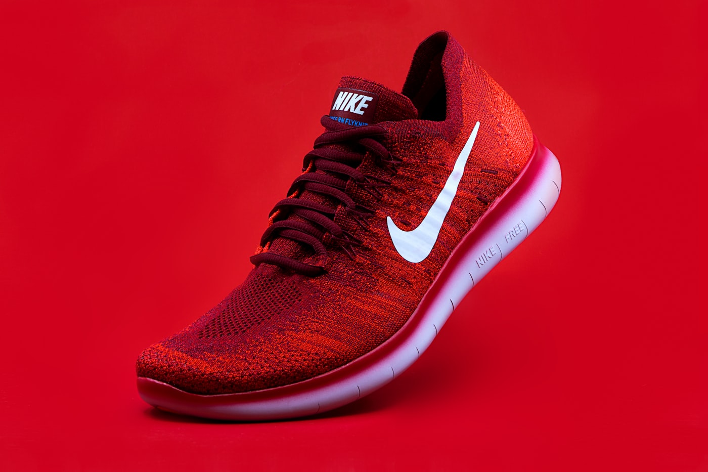 Red sneakers product shot
